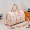 693075876e68136f4d9a6370 Keepall Bandoulière 50 in Damier Golf Coated Canvas – Green Check M40667 and Pink Check M40713