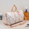 6930758c6e68136f4d9a637c Keepall Bandoulière 50 Travel Bag in Damier Golf Coated Canvas with M40667 Green Check and M40713 Pink Check
