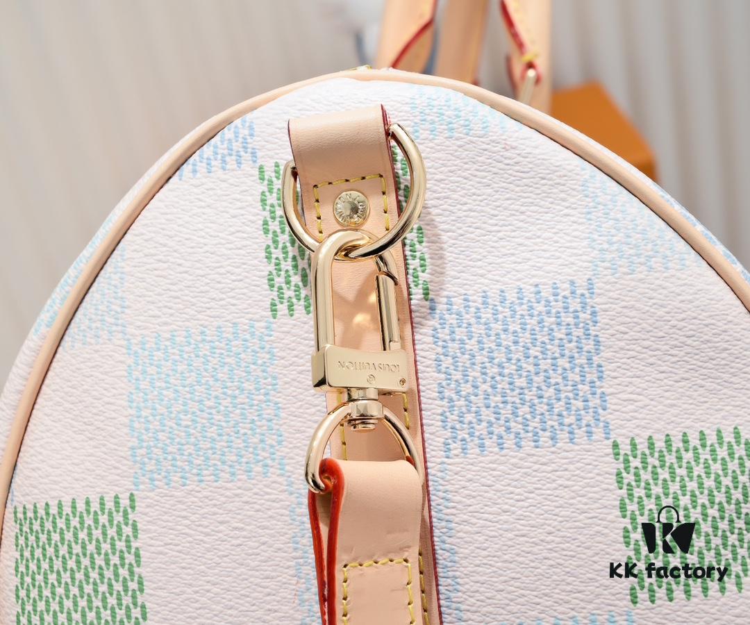 6930758d6e68136f4d9a637d Keepall Bandoulière 50 Travel Bag in Damier Golf Coated Canvas with M40667 Green Check and M40713 Pink Check