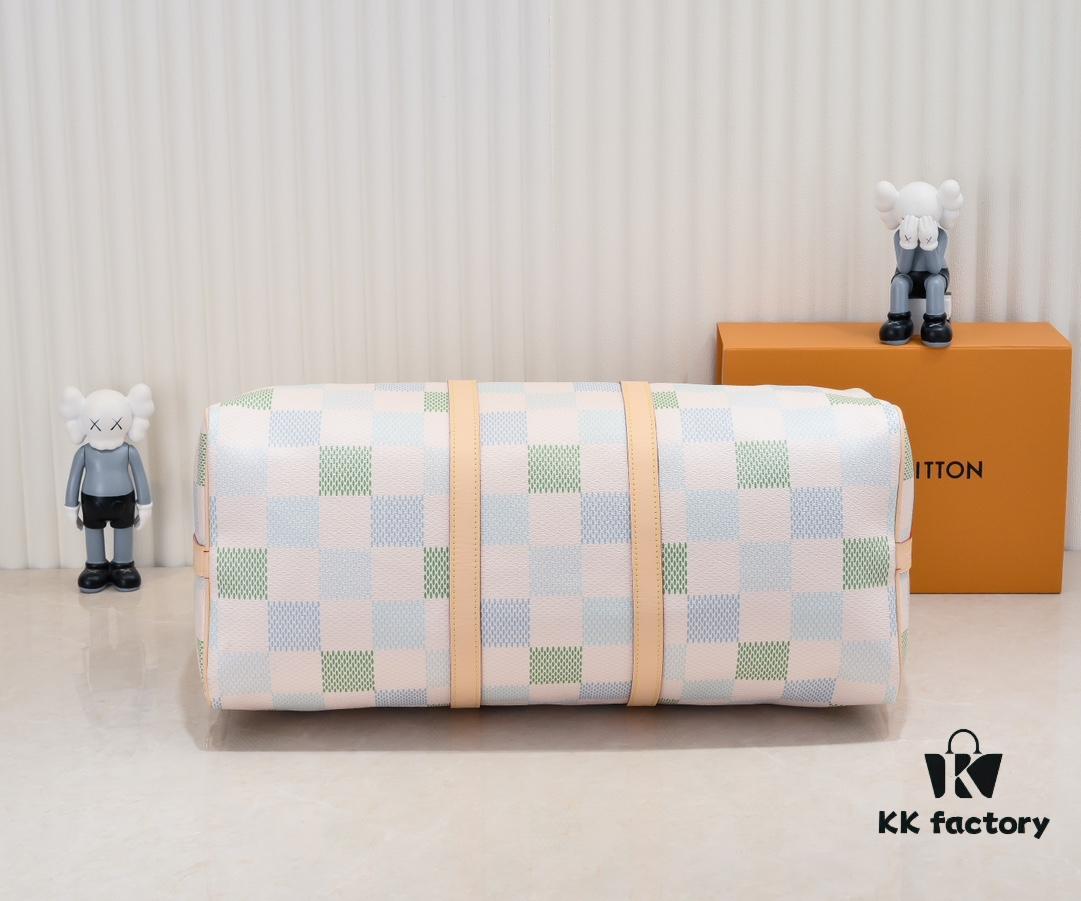 6930758d6e68136f4d9a637e Keepall Bandoulière 50 Travel Bag in Damier Golf Coated Canvas with M40667 Green Check and M40713 Pink Check