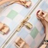 693075906e68136f4d9a637f Keepall Bandoulière 50 Travel Bag in Damier Golf Coated Canvas with M40667 Green Check and M40713 Pink Check