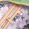 693075936e68136f4d9a6386 Keepall Bandoulière 50 Travel Bag in Damier Golf Coated Canvas with Green and Pink Check Pattern