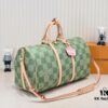 693075956e68136f4d9a638a Keepall Bandoulière 50 Travel Bag in Damier Golf Coated Canvas with Green and Pink Check Pattern