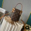 Upgraded Version [Exclusive Real Photo M82952 Damier Azur and Sunflower] This Nano Cannes Handbag features a cylindrical silhouette crafted from Monogram canvas, echoing the design of a makeup pouch.