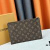 693076aa6e68136f4d9a65c8 M60910, Real Item Photography, Exquisitely Crafted Pallas Clutch Combining Classic Monogram Canvas with Vibrant Colors for a Delightful Effect