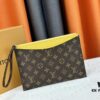 693076dc6e68136f4d9a6628 M60910, Real Item Photography, Exquisitely Crafted Pallas Clutch Combining Classic Monogram Canvas with Vibrant Colors for a Delightful Effect