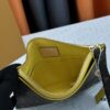 693076e06e68136f4d9a6631 M60910, Real Item Photography, Exquisitely Crafted Pallas Clutch Combining Classic Monogram Canvas with Vibrant Colors for a Delightful Effect