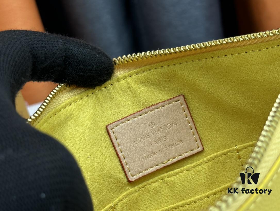 693076e16e68136f4d9a6632 M60910, Real Item Photography, Exquisitely Crafted Pallas Clutch Combining Classic Monogram Canvas with Vibrant Colors for a Delightful Effect