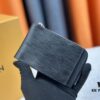693076f06e68136f4d9a664e Top-Grade Original This New Hybrid Wallet is Crafted from Black Monogram Shadow Leather, Ingeniously Combining a Card Holder with Louis Vuitton's Best-Selling Multiple Wallet