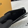 693076f16e68136f4d9a6654 Top-Grade Original This New Hybrid Wallet is Crafted from Black Monogram Shadow Leather, Ingeniously Combining a Card Holder with Louis Vuitton's Best-Selling Multiple Wallet