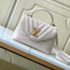 693077bc6e68136f4d9a67e8 Louis Vuitton Hold Me Handbag in Black M21720 and White M21797 – New Wave Quilted Leather Collection