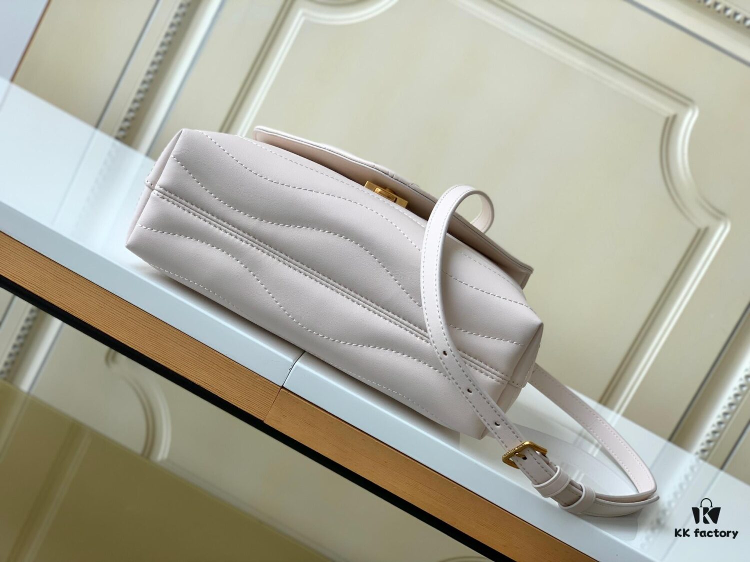 693077be6e68136f4d9a67ef Louis Vuitton Hold Me Handbag in Black M21720 and White M21797 – New Wave Quilted Leather Collection