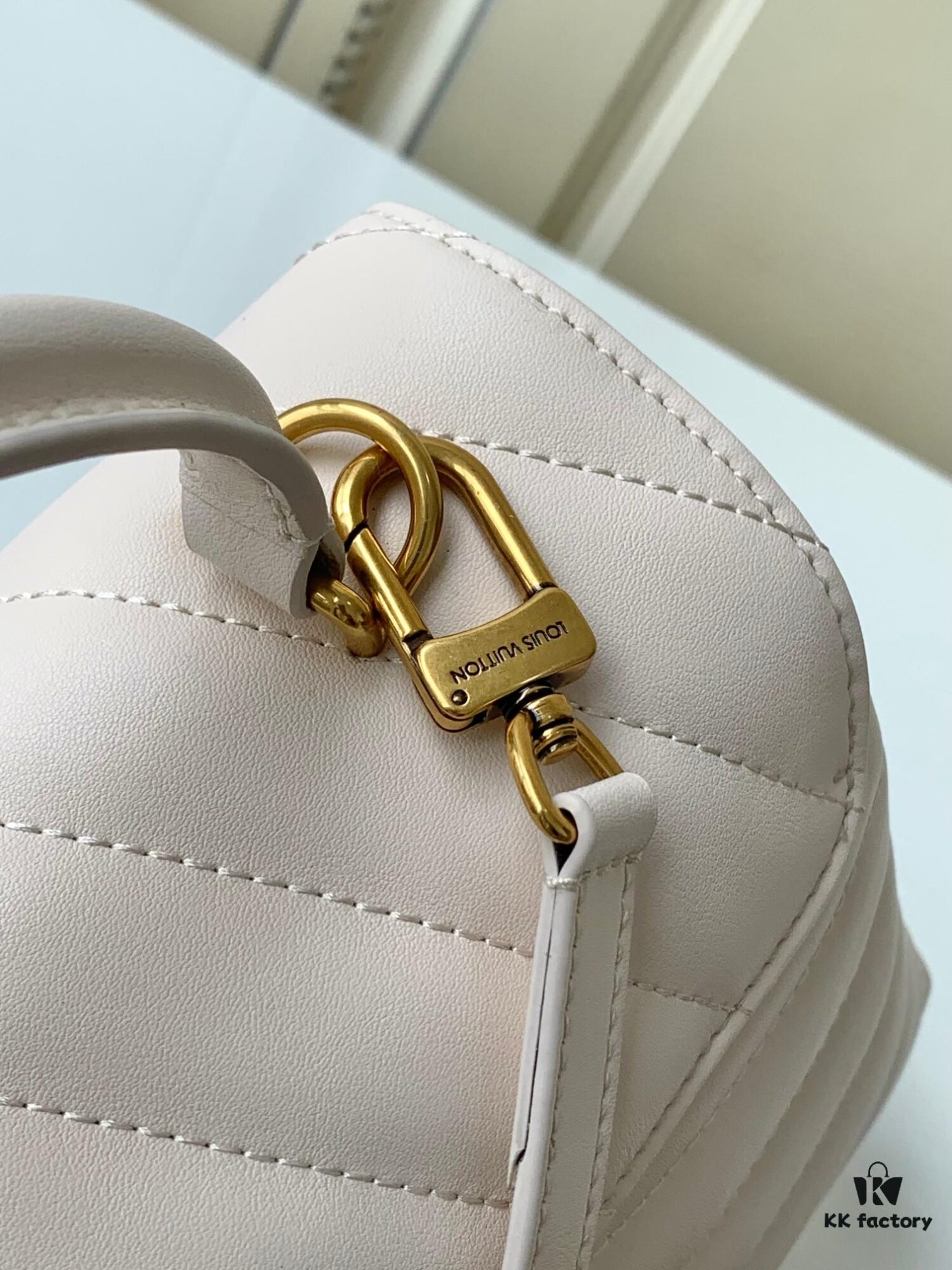 693077bf6e68136f4d9a67f0 Louis Vuitton Hold Me Handbag in Black M21720 and White M21797 – New Wave Quilted Leather Collection