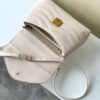 693077c16e68136f4d9a67f2 Louis Vuitton Hold Me Handbag in Black M21720 and White M21797 – New Wave Quilted Leather Collection