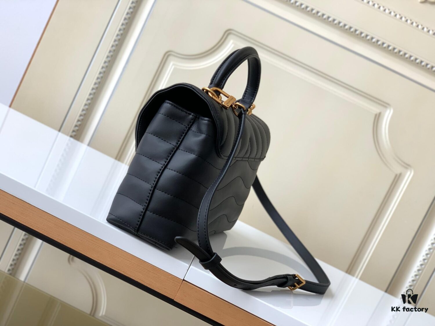 693077c26e68136f4d9a67f4 Louis Vuitton Hold Me Handbag in Black M21720 and White M21797 – New Wave Quilted Leather Collection