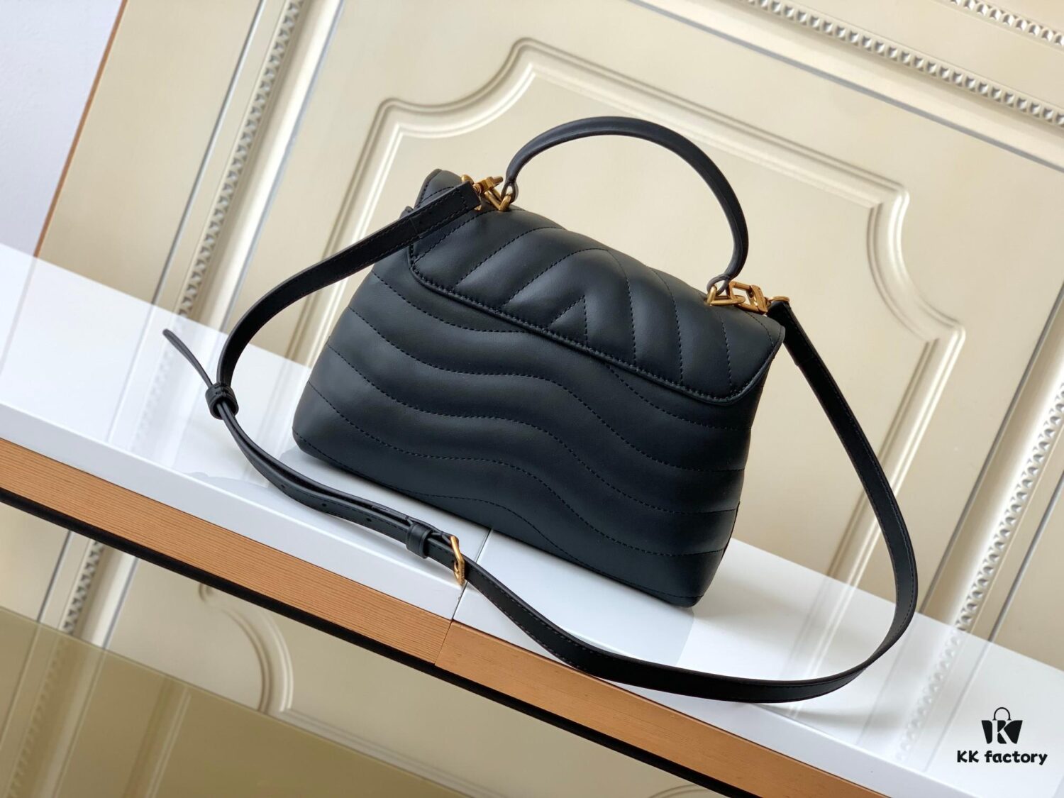 693077c36e68136f4d9a67f5 Louis Vuitton Hold Me Handbag in Black M21720 and White M21797 – New Wave Quilted Leather Collection