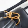 693077c46e68136f4d9a67f8 Louis Vuitton Hold Me Handbag in Black M21720 and White M21797 – New Wave Quilted Leather Collection