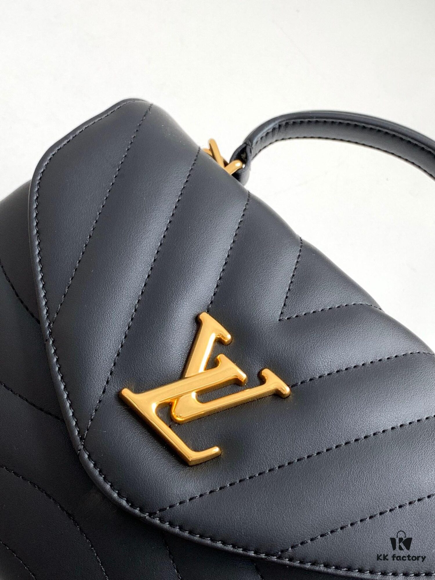 693077c46e68136f4d9a67f9 Louis Vuitton Hold Me Handbag in Black M21720 and White M21797 – New Wave Quilted Leather Collection