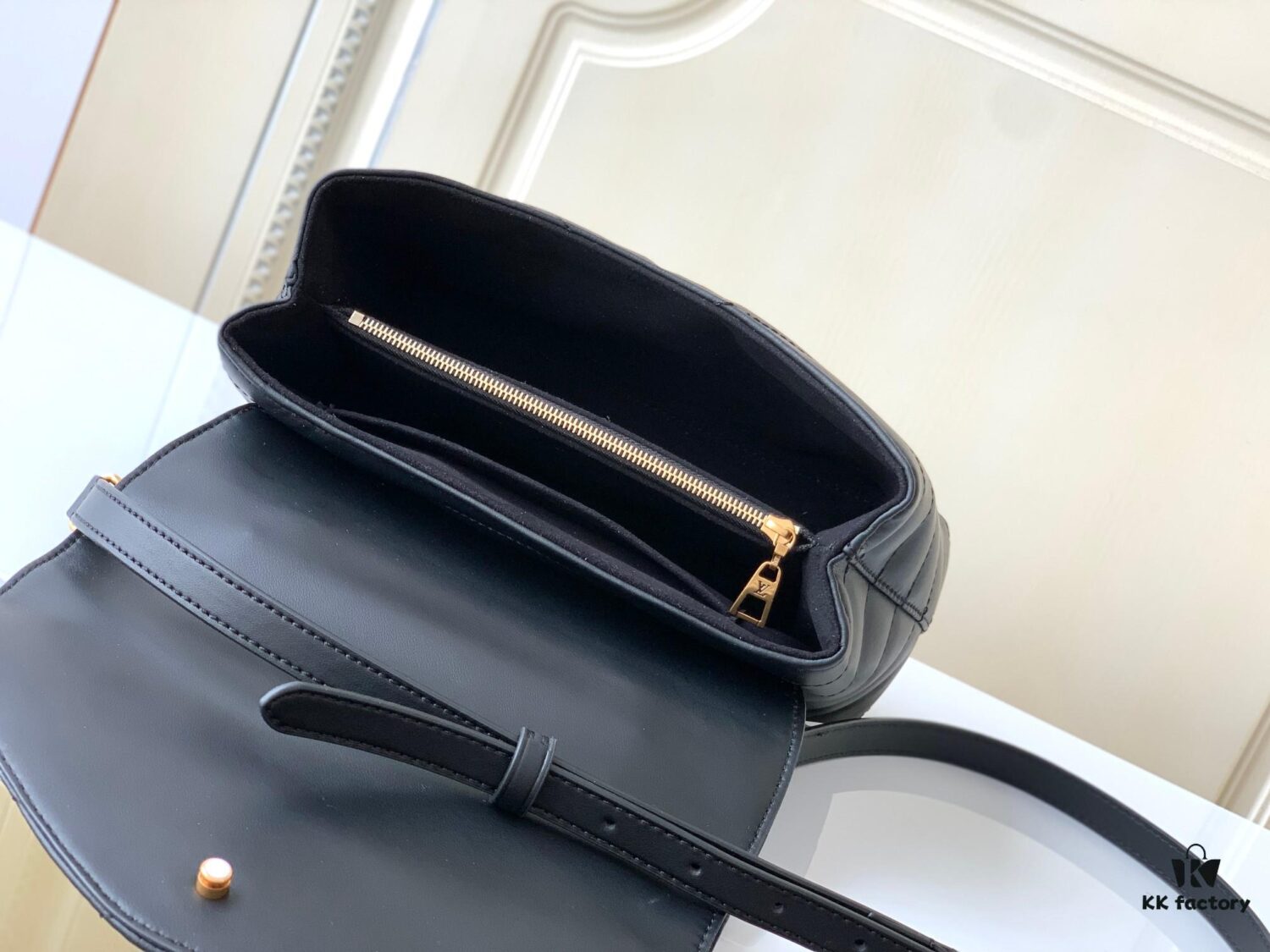 693077c56e68136f4d9a67fa Louis Vuitton Hold Me Handbag in Black M21720 and White M21797 – New Wave Quilted Leather Collection