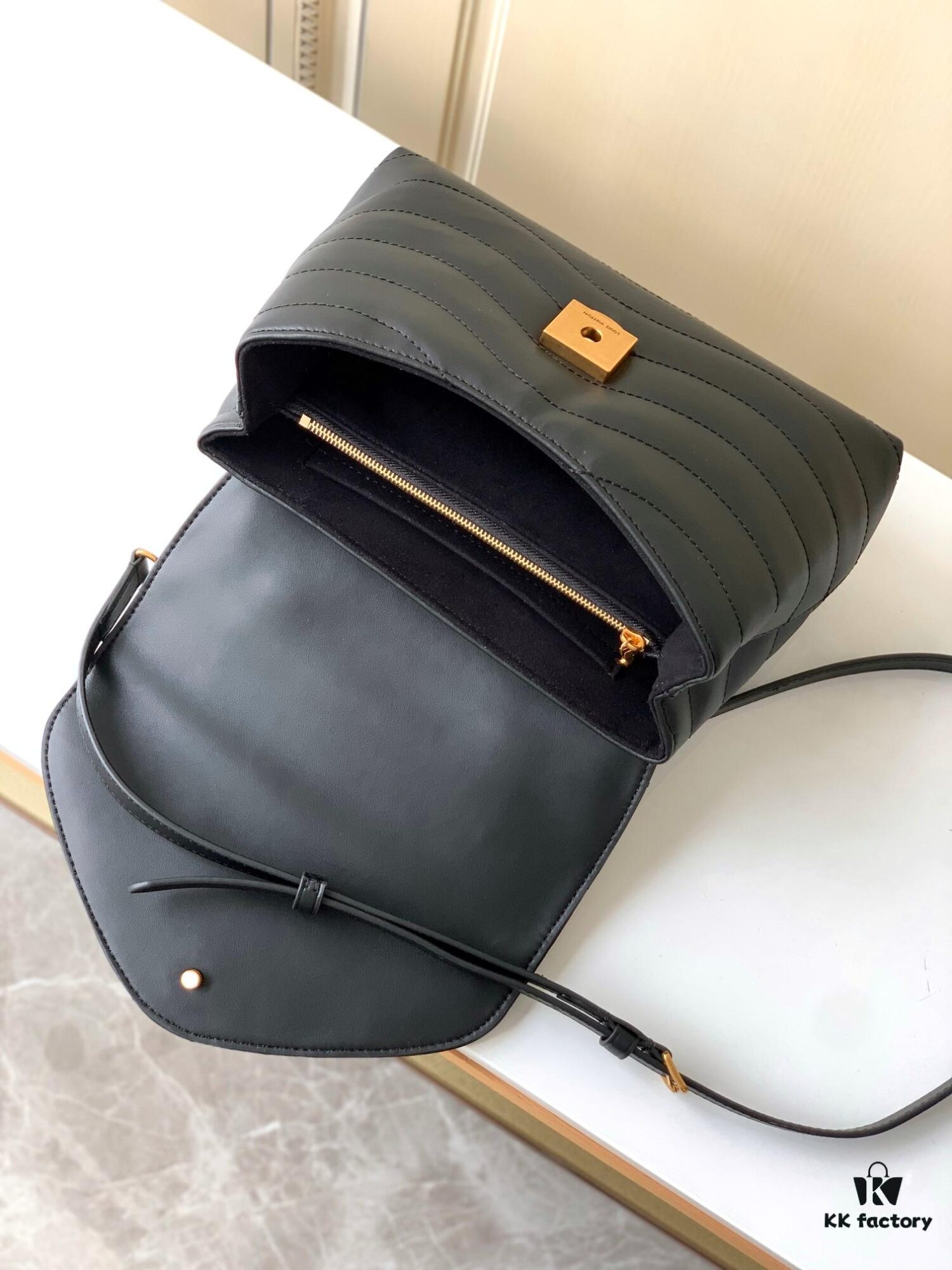 693077c56e68136f4d9a67fb Louis Vuitton Hold Me Handbag in Black M21720 and White M21797 – New Wave Quilted Leather Collection