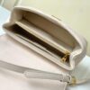 693077c76e68136f4d9a67fd Louis Vuitton Hold Me Handbag in Black M21720 and White M21797 – New Wave Quilted Leather Collection