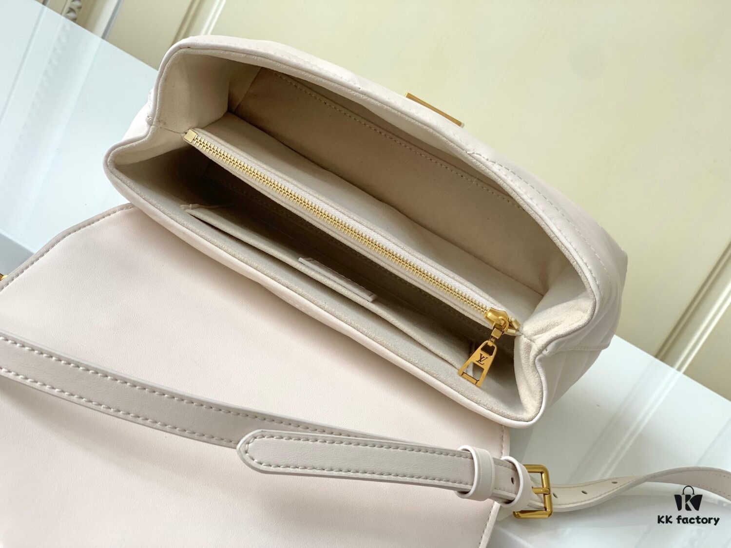 693077c76e68136f4d9a67fd Louis Vuitton Hold Me Handbag in Black M21720 and White M21797 – New Wave Quilted Leather Collection