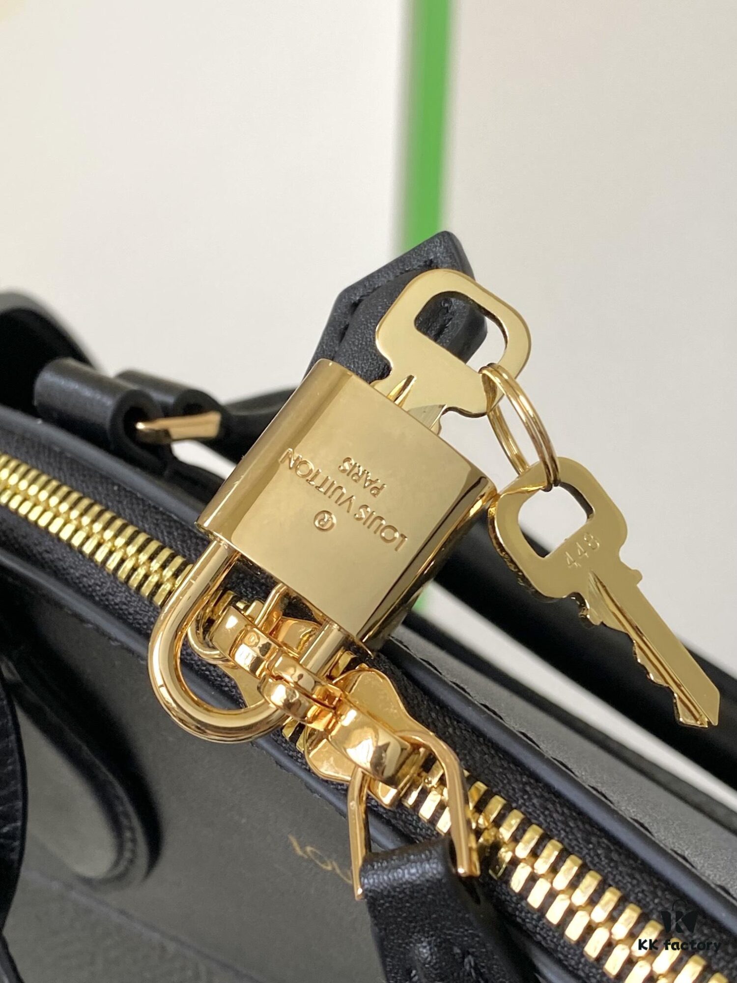 693077dc6e68136f4d9a6827 M22914 Black Lock It MM Bag in Refined Taurillon Leather with Gold-Tone Hardware
