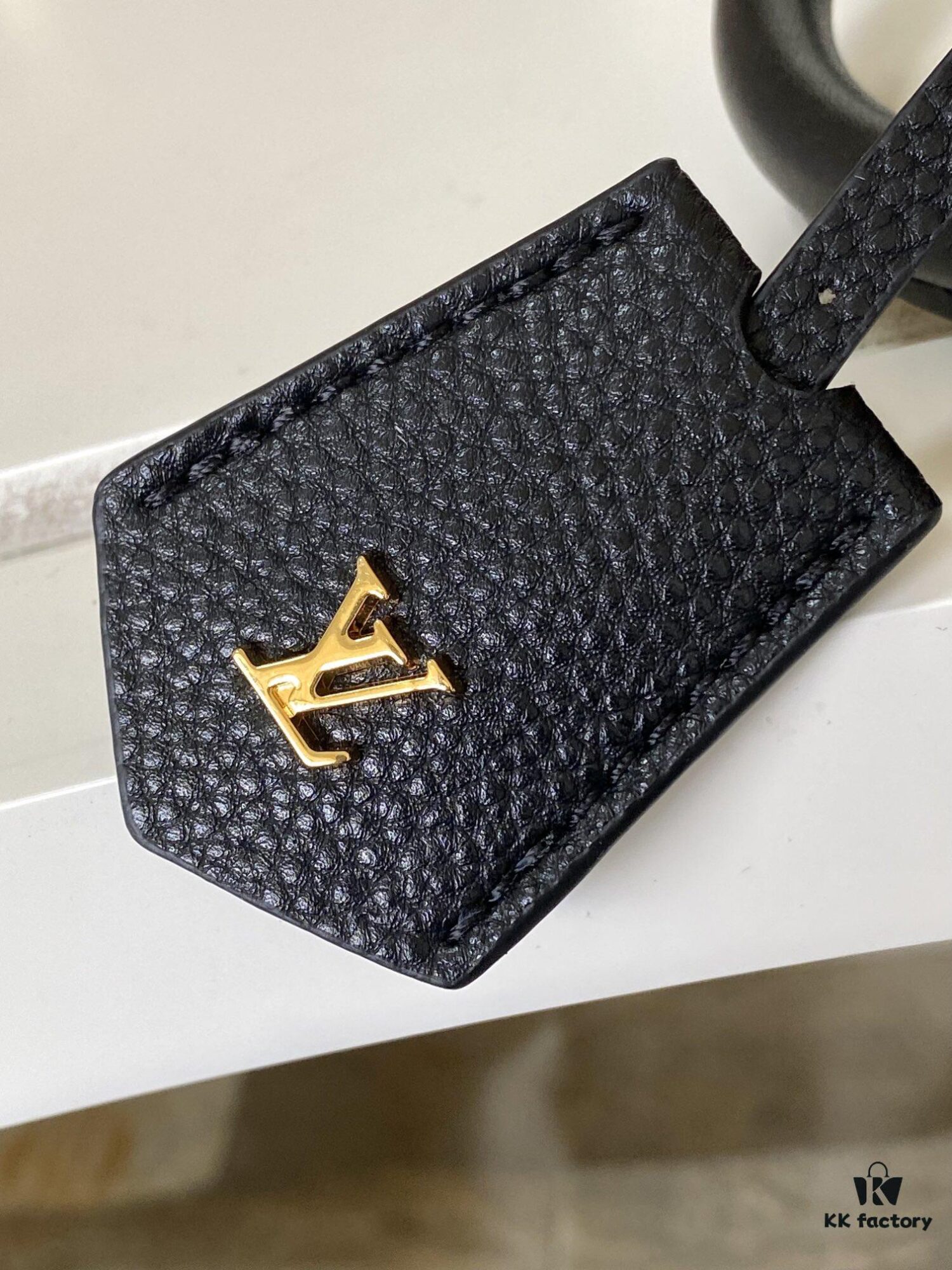 693077dd6e68136f4d9a6828 M22914 Black Lock It MM Bag in Refined Taurillon Leather with Gold-Tone Hardware