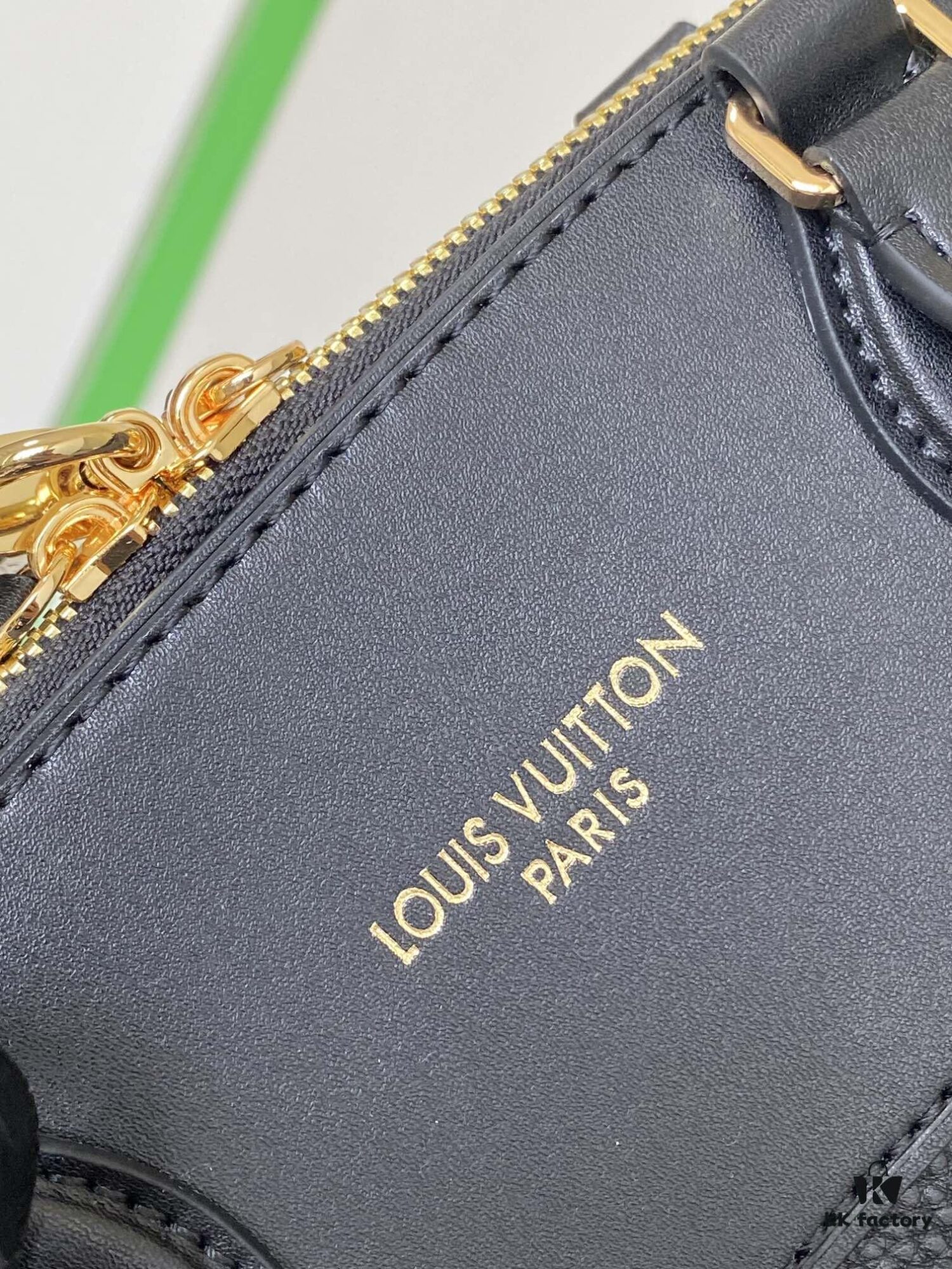 693077de6e68136f4d9a682c M22914 Black Lock It MM Bag in Refined Taurillon Leather with Gold-Tone Hardware