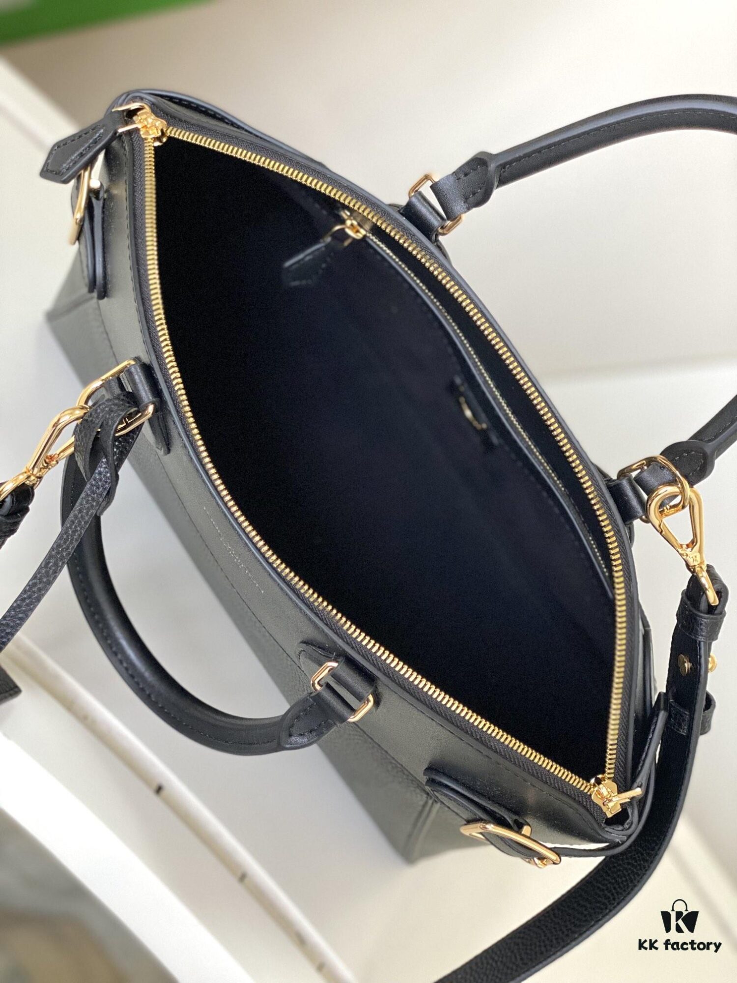 693077df6e68136f4d9a682f M22914 Black Lock It MM Bag in Refined Taurillon Leather with Gold-Tone Hardware