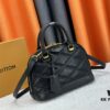 693078196e68136f4d9a68a8 Model: M23666 Shell Bag 💋💋 This Alma BB Handbag Draws Inspiration from the Diamond-Quilted Lining of Louis Vuitton's Rigid Trunks