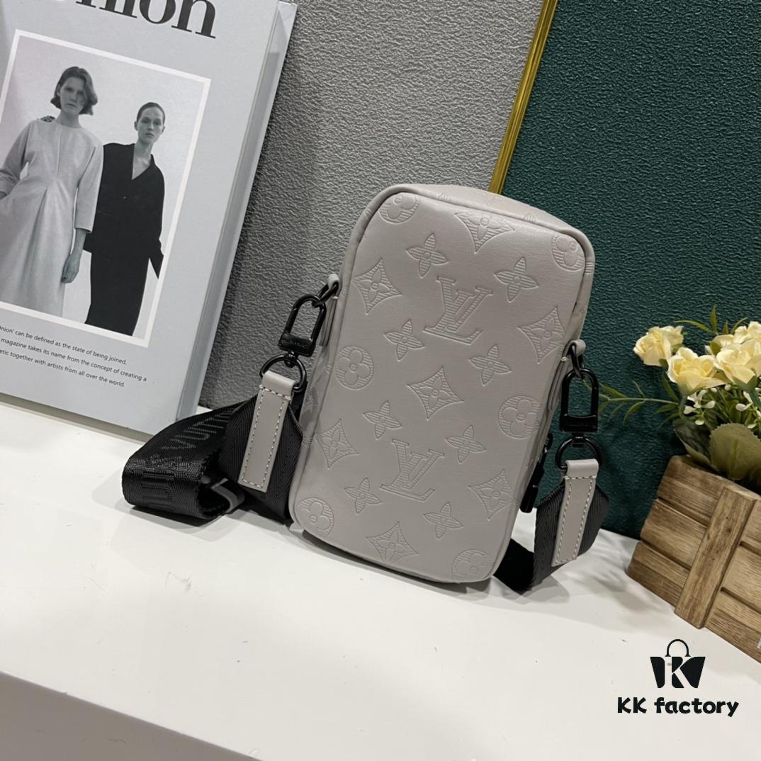 693078a46e68136f4d9a69d4 Upgraded Version! Latest Release! M81321 M81323 M81005 Black Grey Floral, Black Embossed, Grey Embossed Flap Double Phone Pouch — A Capsule Collection by Japanese Designer and DJ Nigo and Virgil Abloh for Louis Vuitton. This Flap Double phone bag features a shoulder strap, black-silver two-tone flap, messenger-style design, ideal for storing your phone and daily essentials.