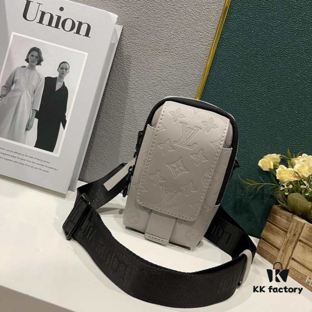 Upgraded Version! Latest Release! M81321 M81323 M81005 Black Grey Floral, Black Embossed, Grey Embossed Flap Double Phone Pouch — A Capsule Collection by Japanese Designer and DJ Nigo and Virgil Abloh for Louis Vuitton. This Flap Double phone bag features a shoulder strap, black-silver two-tone flap, messenger-style design, ideal for storing your phone and daily essentials.