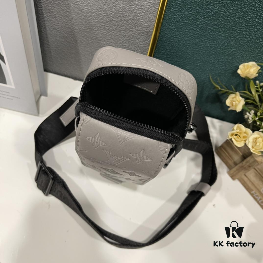 693078a66e68136f4d9a69d7 Upgraded Version! Latest Release! M81321 M81323 M81005 Black Grey Floral, Black Embossed, Grey Embossed Flap Double Phone Pouch — A Capsule Collection by Japanese Designer and DJ Nigo and Virgil Abloh for Louis Vuitton. This Flap Double phone bag features a shoulder strap, black-silver two-tone flap, messenger-style design, ideal for storing your phone and daily essentials.