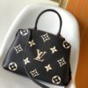 693078d16e68136f4d9a6a34 Petit Palais Handbag in Grained Leather with Oversized Monogram Flower and LV Initials
