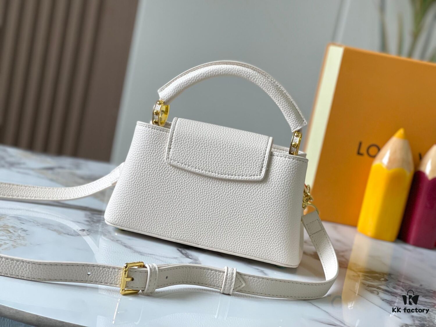 693078f36e68136f4d9a6a72 Top-Quality Guangzhou Stock M14393 White Capucines East West Mini Bag
