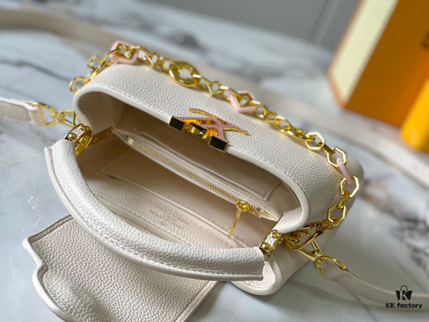 693078f56e68136f4d9a6a77 Top-Quality Guangzhou Stock M14393 White Capucines East West Mini Bag