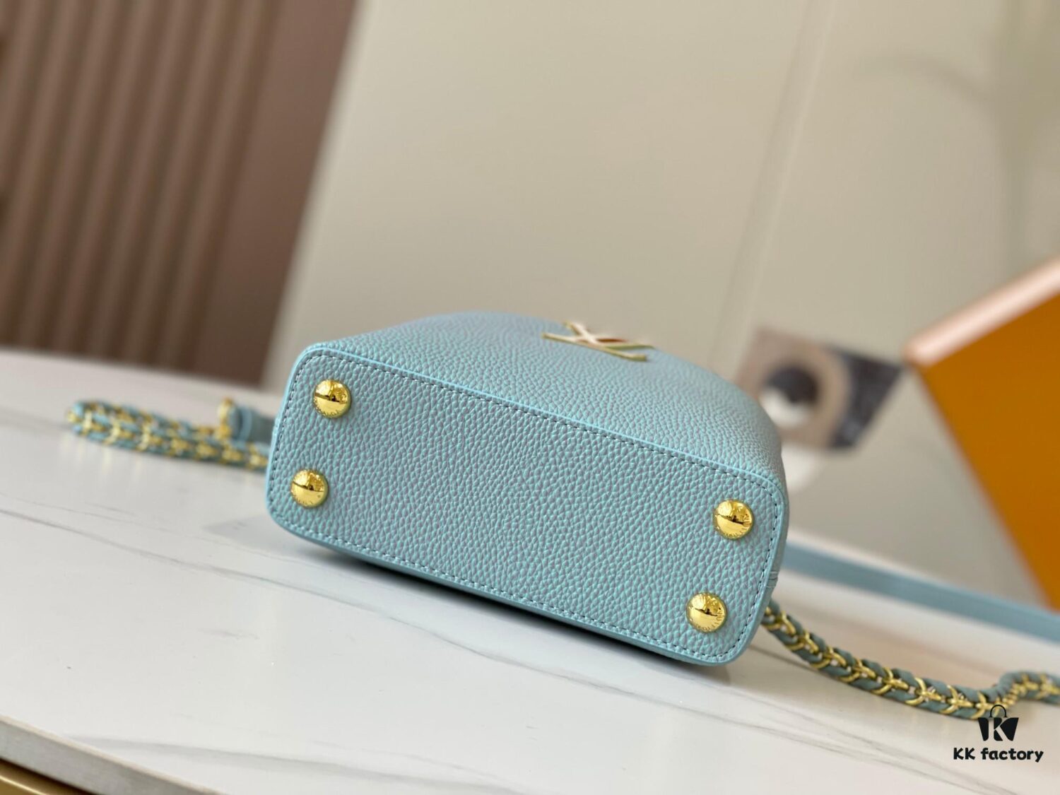 6930798b6e68136f4d9a6b67 Upgraded M59850 Stellar Pearlized Blue Shell Button Capucines Mini Bag