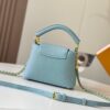 6930798c6e68136f4d9a6b68 Upgraded M59850 Stellar Pearlized Blue Shell Button Capucines Mini Bag
