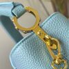 6930798e6e68136f4d9a6b69 Upgraded M59850 Stellar Pearlized Blue Shell Button Capucines Mini Bag