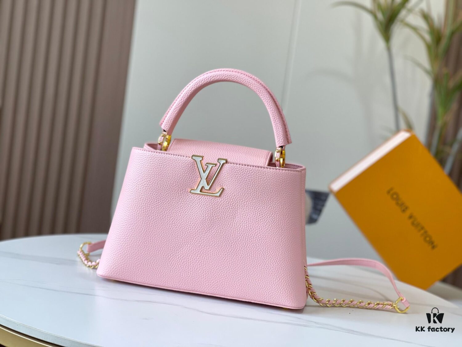 6930798f6e68136f4d9a6b6c Upgraded M20841 Etoile Pearlized Pink Shell Button Capucines MM Handbag