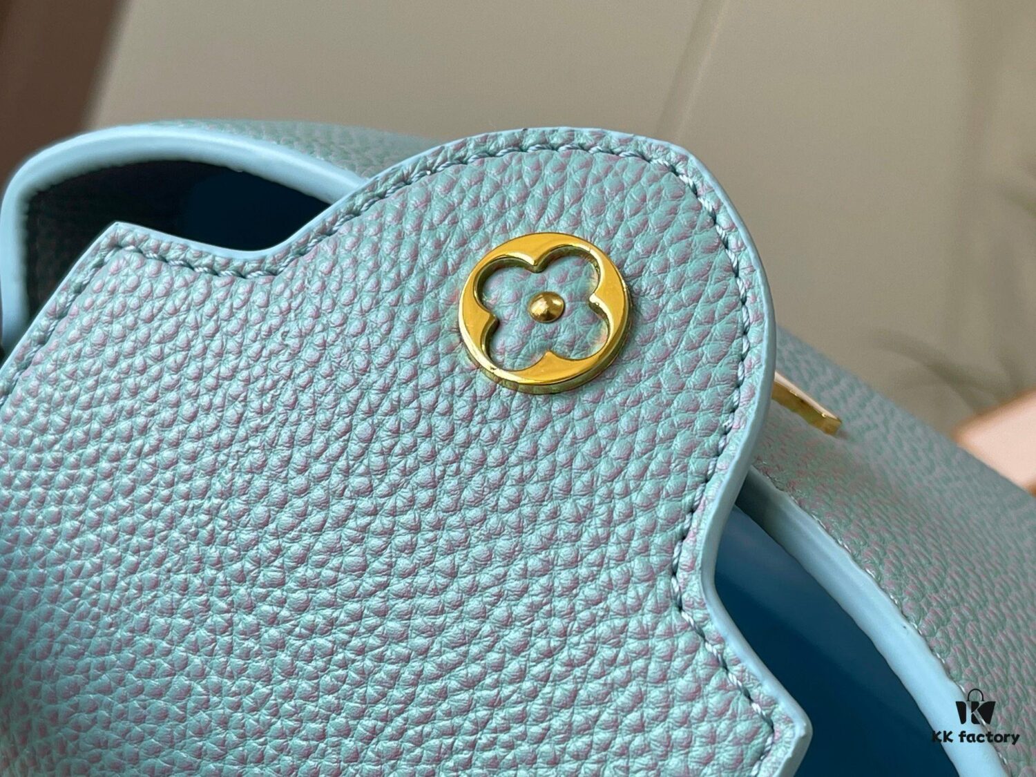 6930798f6e68136f4d9a6b6d Upgraded M59850 Stellar Pearlized Blue Shell Button Capucines Mini Bag