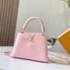 693079946e68136f4d9a6b75 Upgraded M59868 Stellar Pearlized Powder with Mother-of-Pearl Button - This Capucines BB Bag Features Taurillon Leather That Shimmers in Changing Hues Under Different Lights