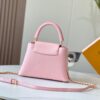 693079956e68136f4d9a6b77 Upgraded M59868 Stellar Pearlized Powder with Mother-of-Pearl Button - This Capucines BB Bag Features Taurillon Leather That Shimmers in Changing Hues Under Different Lights