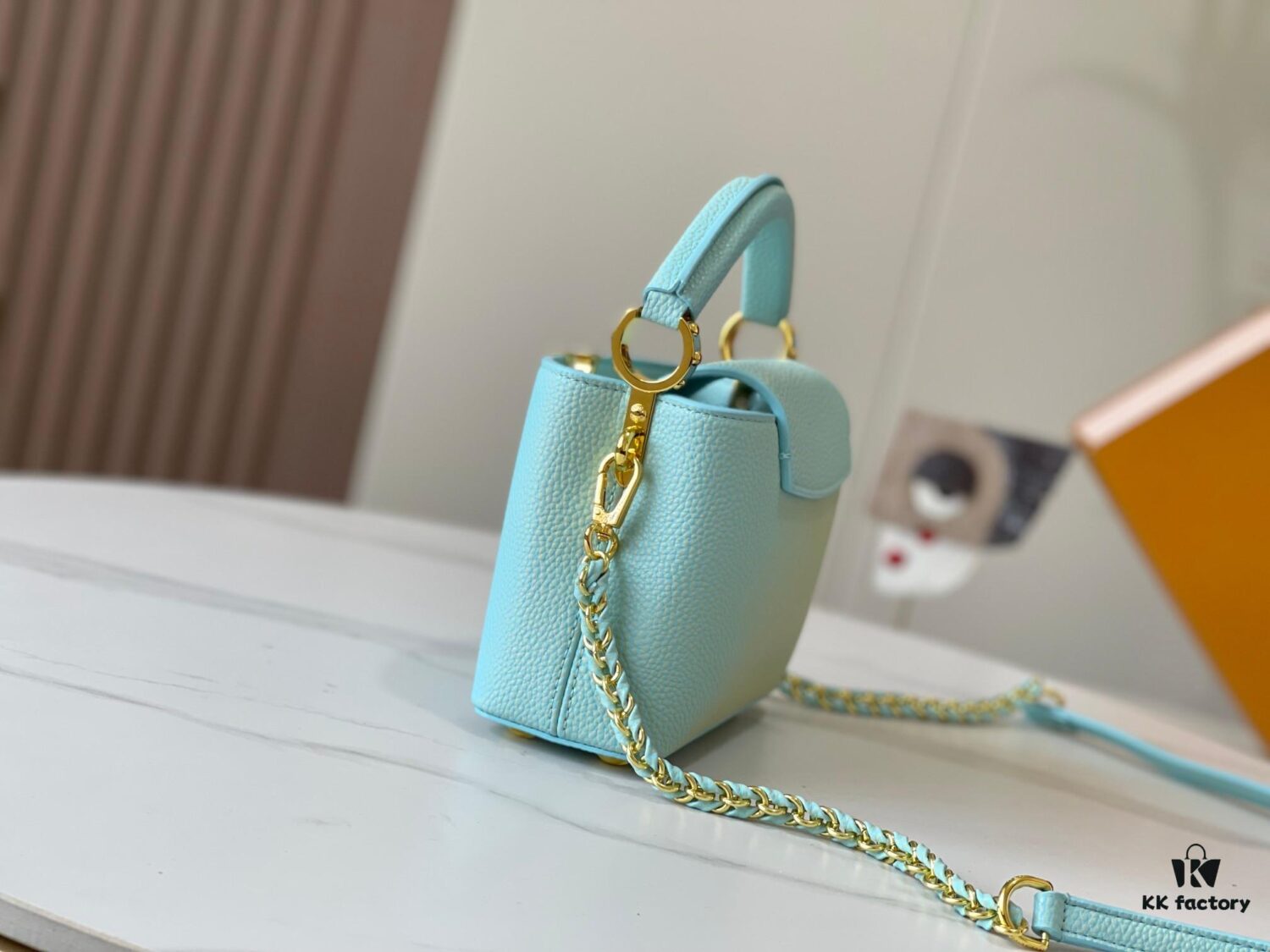 693079aa6e68136f4d9a6b9b Upgraded M59850 Stellar Pearl Blue Shell Button Capucines Mini Bag