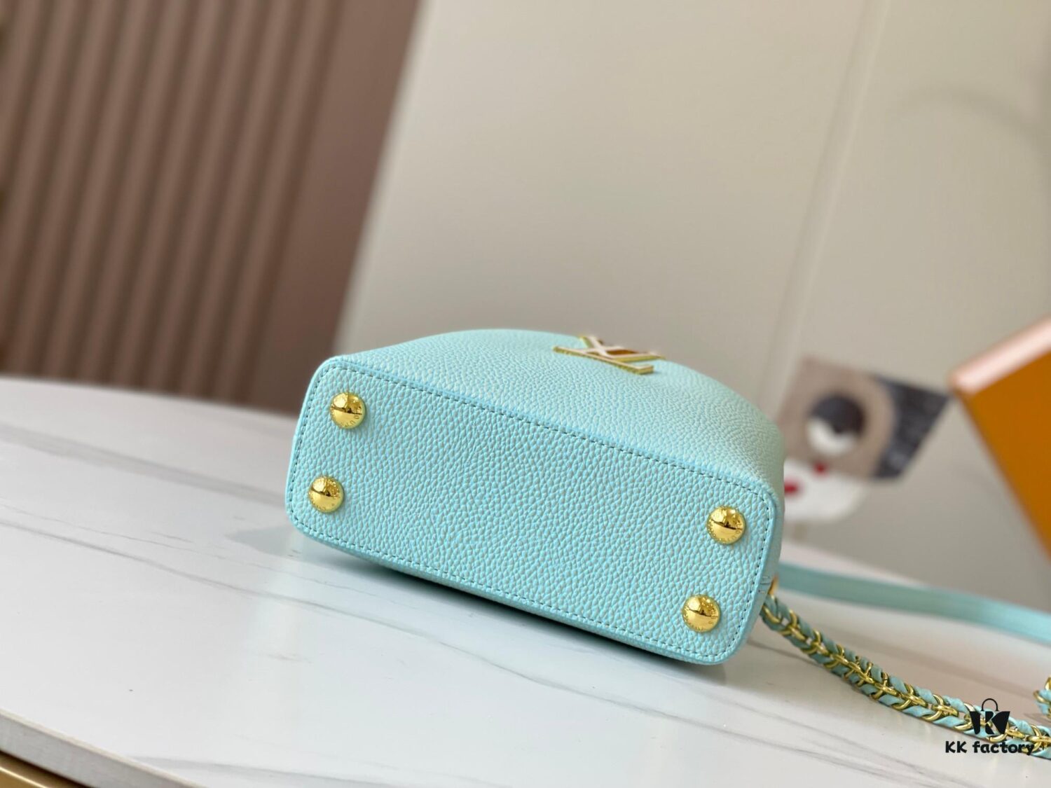 693079ab6e68136f4d9a6b9d Upgraded M59850 Stellar Pearl Blue Shell Button Capucines Mini Bag