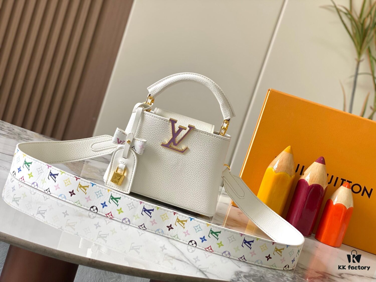 69307a386e68136f4d9a6c8f Guangzhou Stock Top Quality Original Version Capucines Mini Model: 12352 White with 33 Colorful Elements Material: Crushed Calfskin Hardware Upgraded Features: LV Initials, Unique Border Ring, Exquisite Monogram Flower on Flap Closure Dimensions: 21×14×8cm