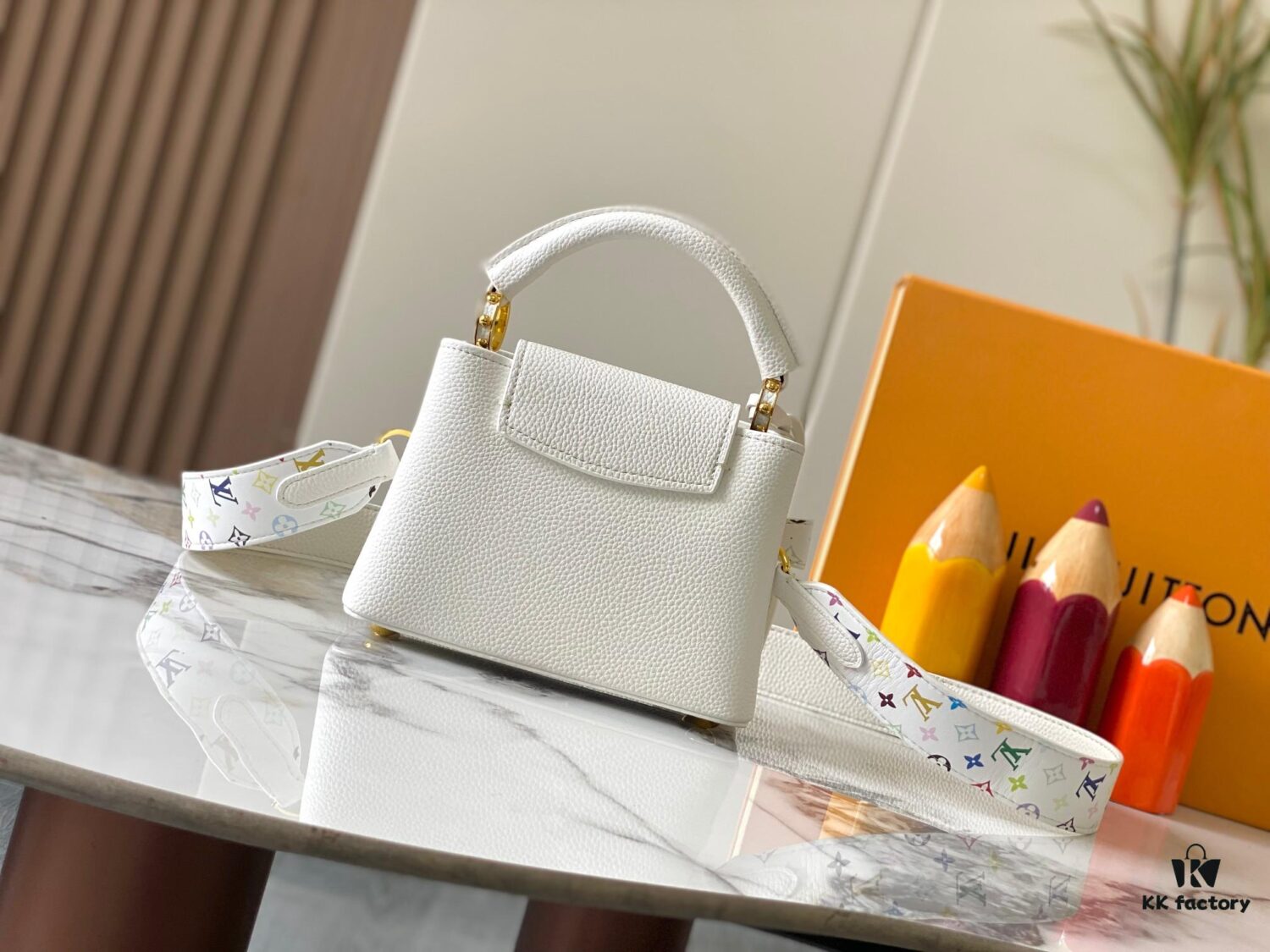 69307a386e68136f4d9a6c91 Guangzhou Stock Top Quality Original Version Capucines Mini Model: 12352 White with 33 Colorful Elements Material: Crushed Calfskin Hardware Upgraded Features: LV Initials, Unique Border Ring, Exquisite Monogram Flower on Flap Closure Dimensions: 21×14×8cm