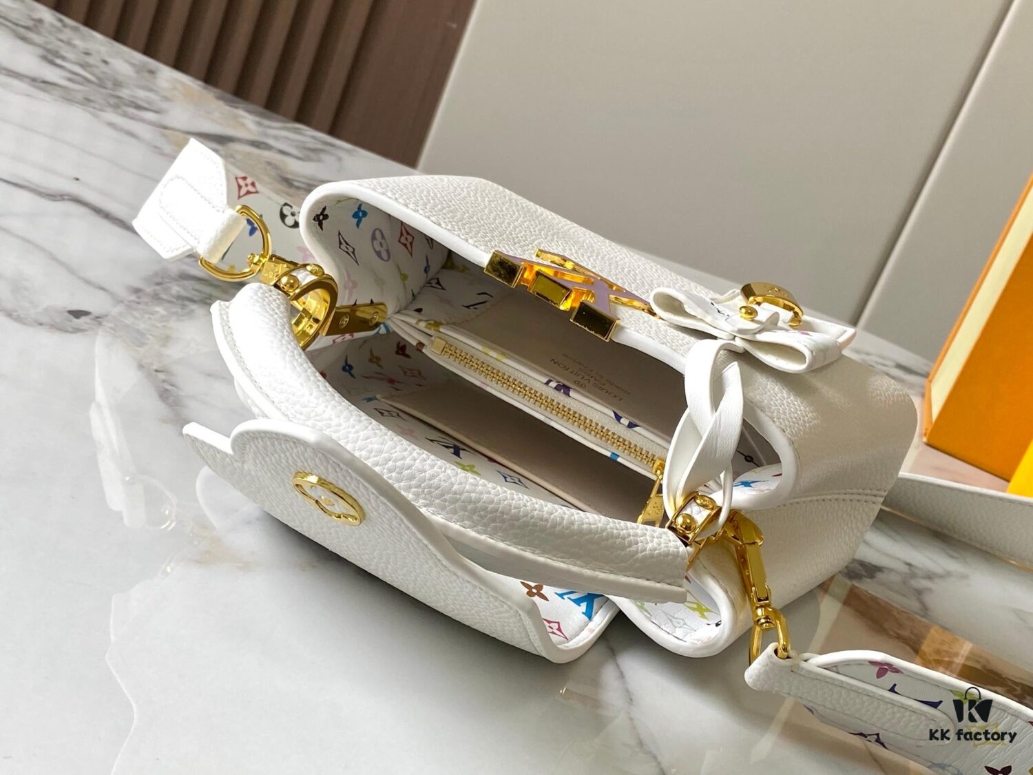 69307a3c6e68136f4d9a6c97 Guangzhou Stock Top Quality Original Version Capucines Mini Model: 12352 White with 33 Colorful Elements Material: Crushed Calfskin Hardware Upgraded Features: LV Initials, Unique Border Ring, Exquisite Monogram Flower on Flap Closure Dimensions: 21×14×8cm