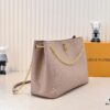 69307a5e6e68136f4d9a6cd4 M14414 M14659 M14234 This Anytime Medium Bag Reimagines the Classic 1988 Promenade Bag
